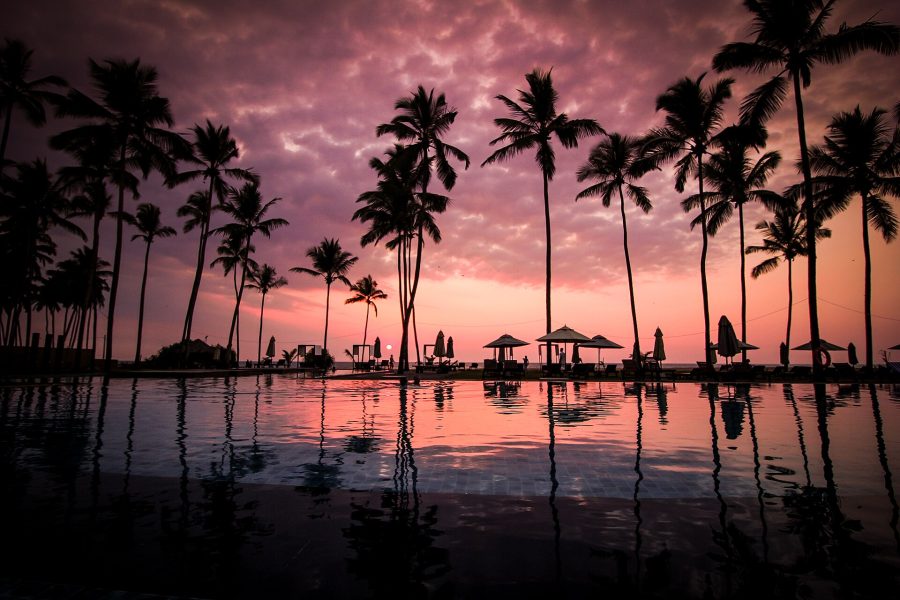 A resort swimming pool at sunset, the kind of holiday accommodation covered by the ASA's eco advertising rulings