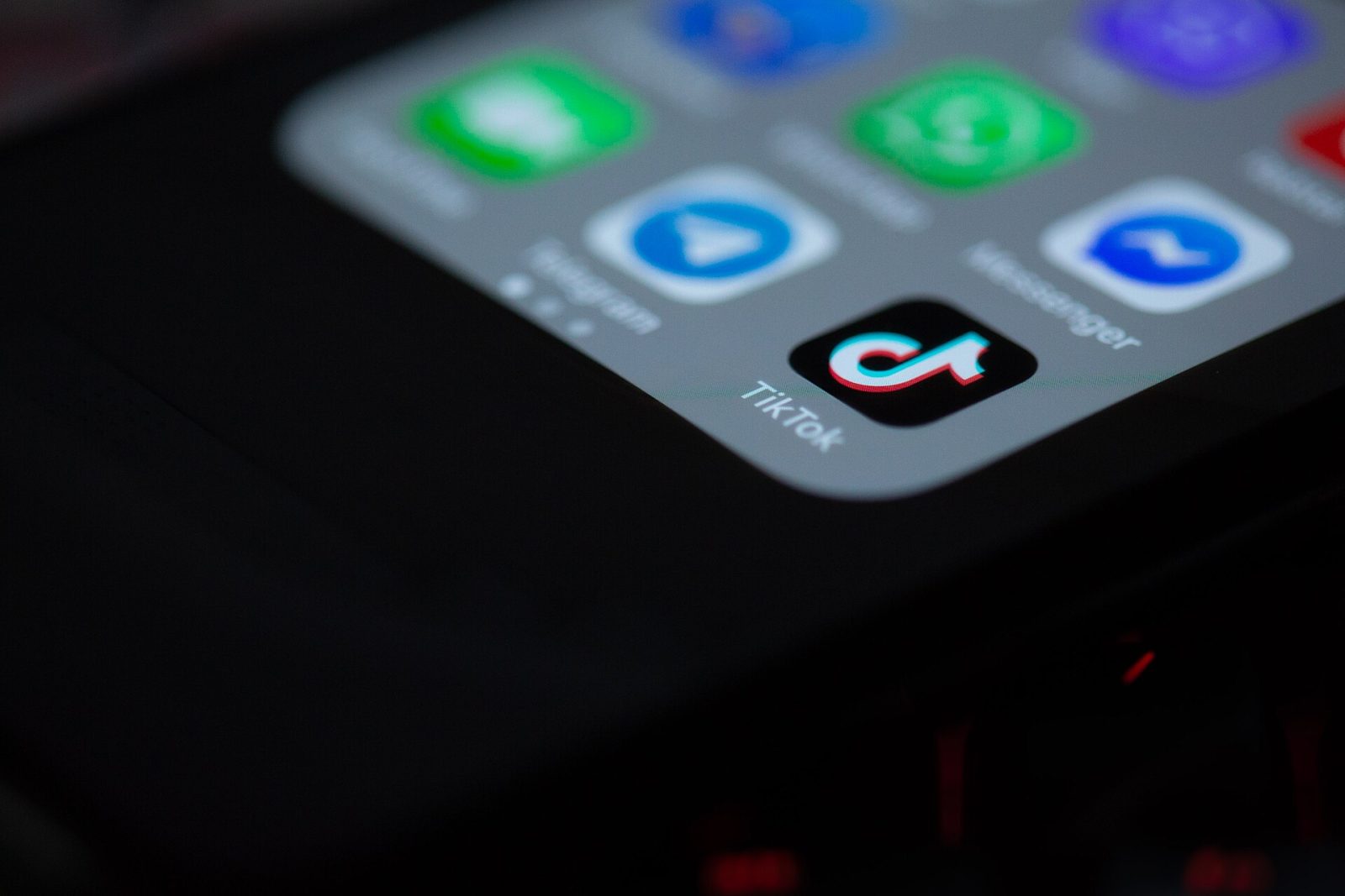 The TikTok app icon on a smartphone screen