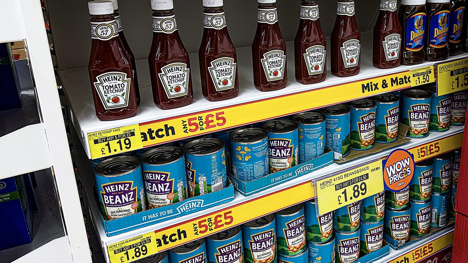 Heinz tomato ketchup and Heinz Beanz on a supermarket shelf