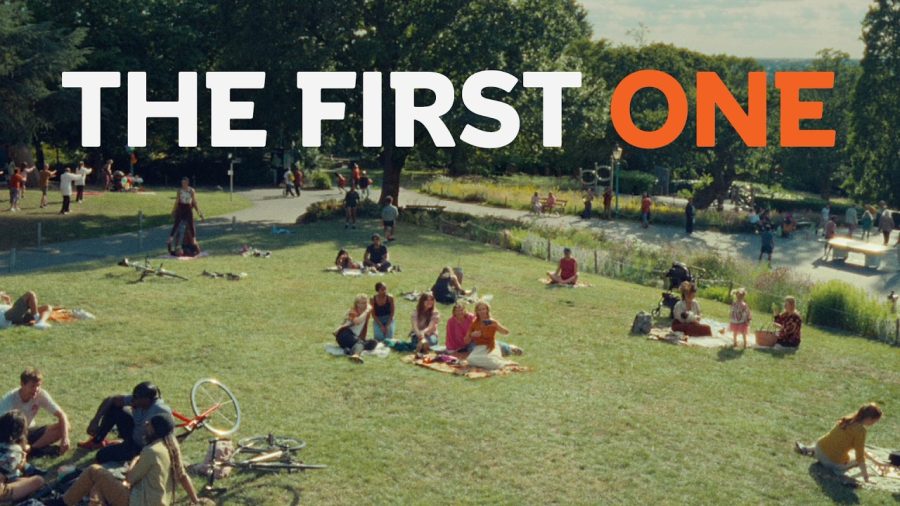 A crowded British park under the title The First One in Alzheimer's Research UK's campaign film