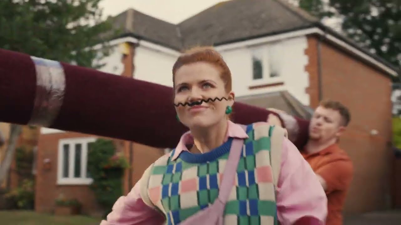 A woman with a newly sprouted moustache in Go.Compare's Feel the Tache advert