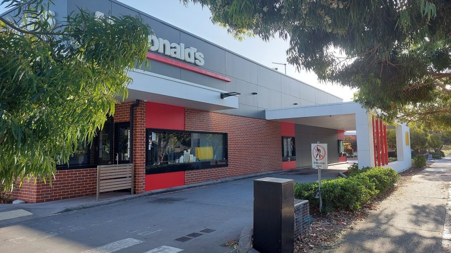 A McDonald's restaurant and its drive-through lane