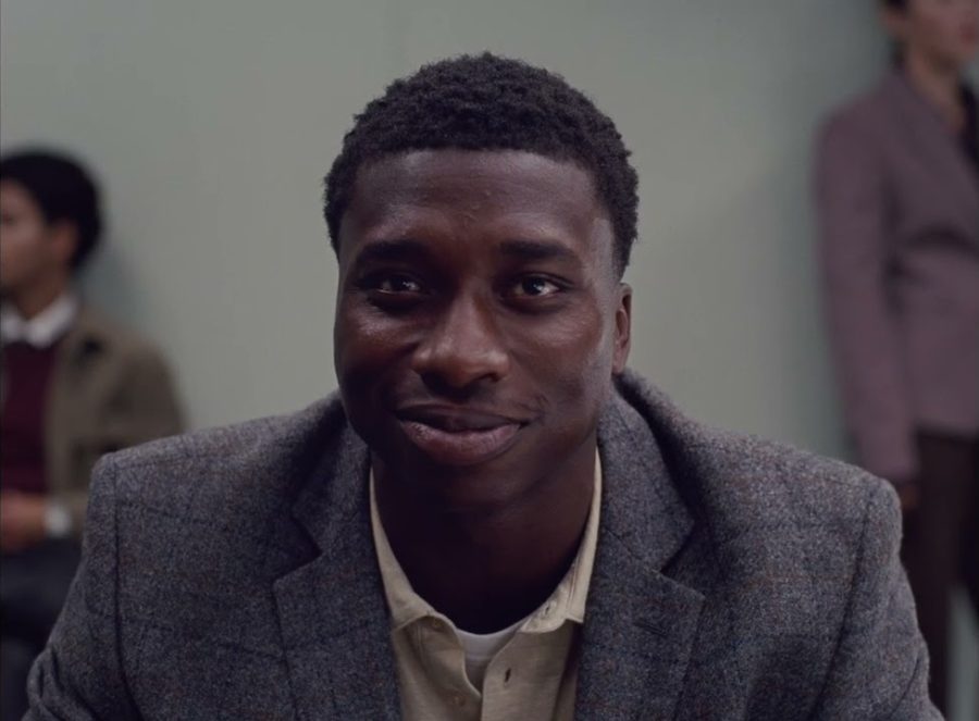 Ebenezer Gyau in the waiting room in People Like Us's film Dear [Name]