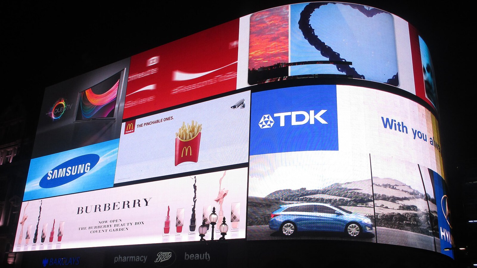 The digital advertising screens at Piccadilly Circus in London at night