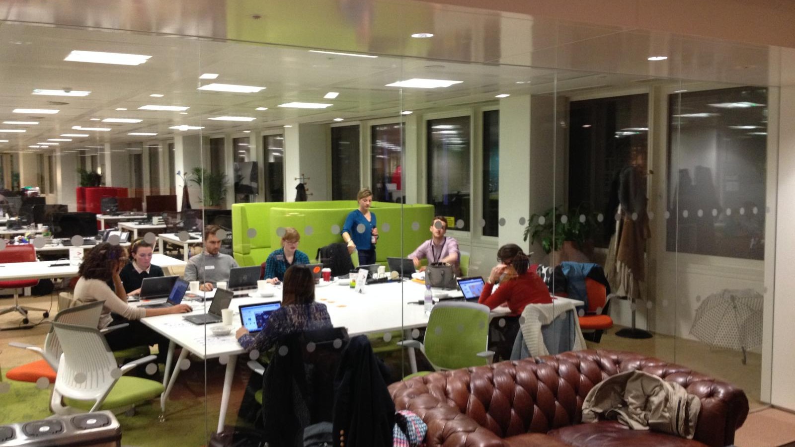 People working at desks in Accenture's London office
