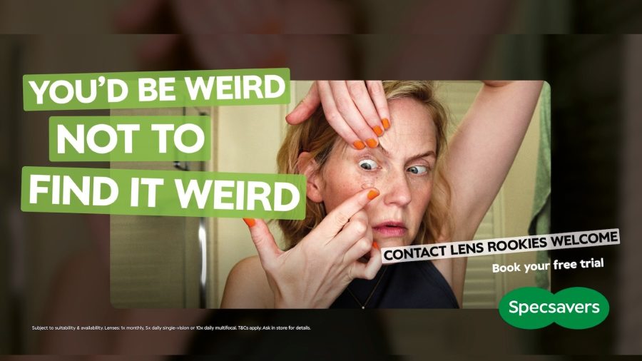 Specsavers ad of a woman holding her eye open to put in a contact lens, with the line You would be weird not to find it weird