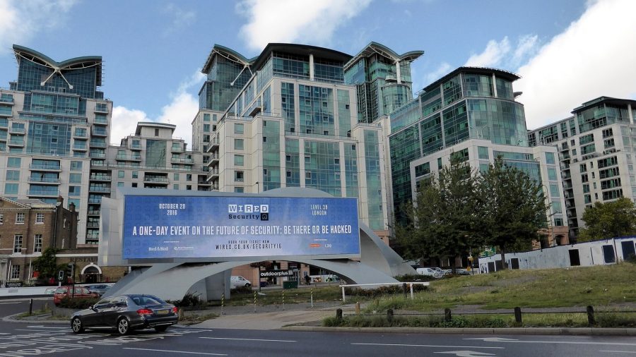 A large roadside advertising billboard at Vauxhall Cross in London